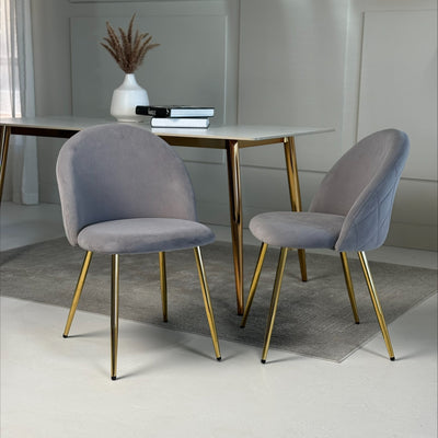 Grey velvet dining chairs with gold legs