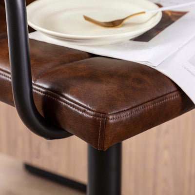 Richard Brown Black leather bar stool with black base